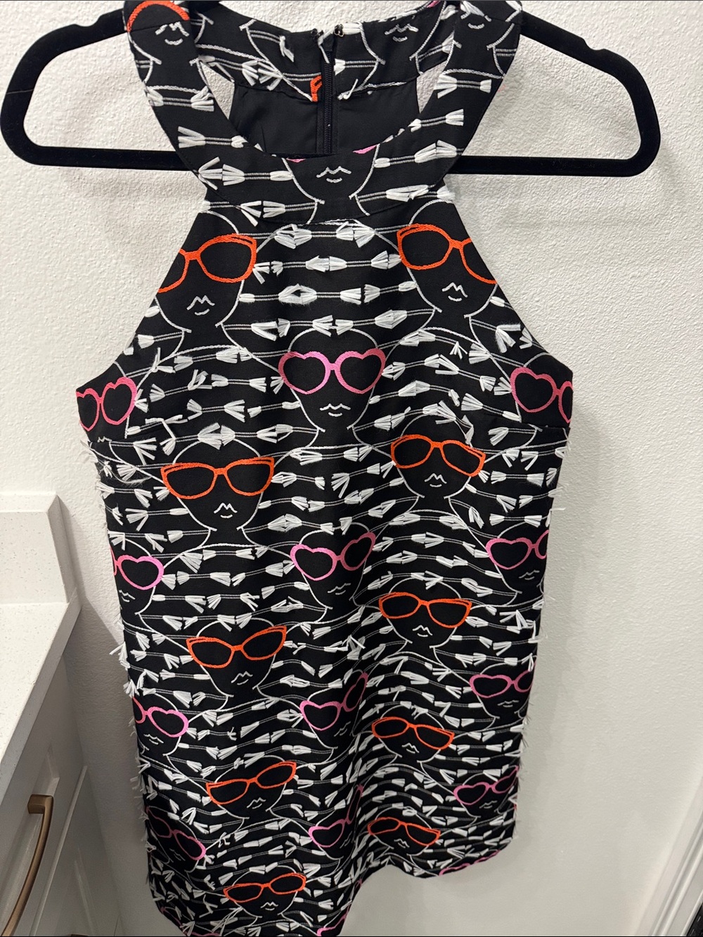 Hutch Black Sleeveless One-Piece with Pink & Orange Sunglasses Print